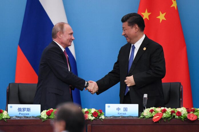 Poutine et Xi Jinping affichent leur proximité